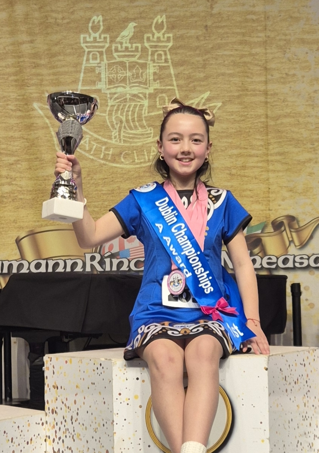 Dancer celebrating first place at the Dublin Championships